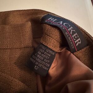 Ladies dress suit. Jacket size 8; slacks size 12.